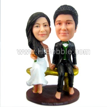 Couple Sitting On a Bench Custom Bobbleheads From Your Photos